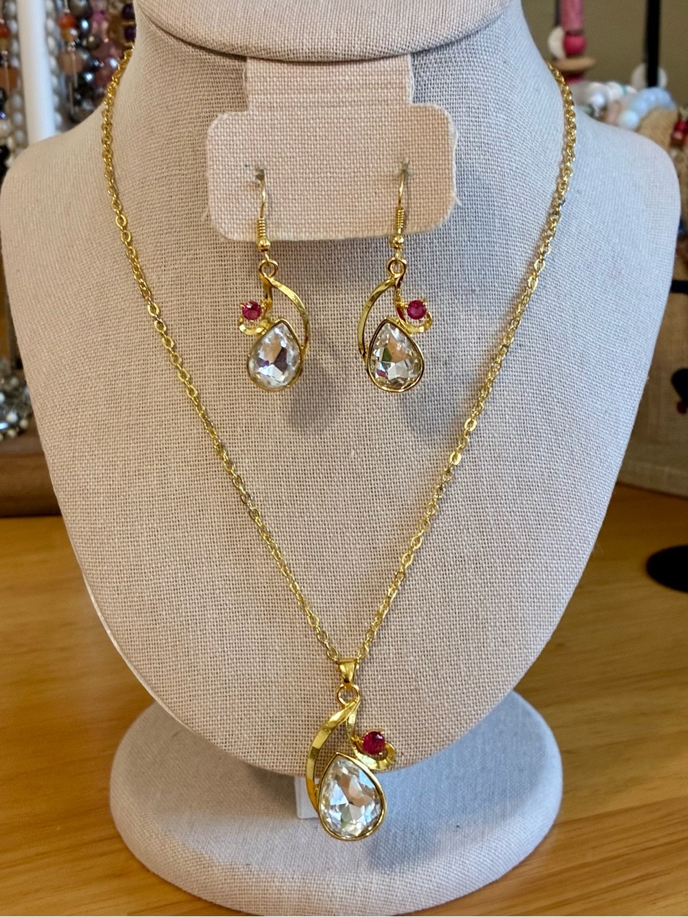 Vintage gold-tone pendant necklace and matching pierced earrings jewelry set.